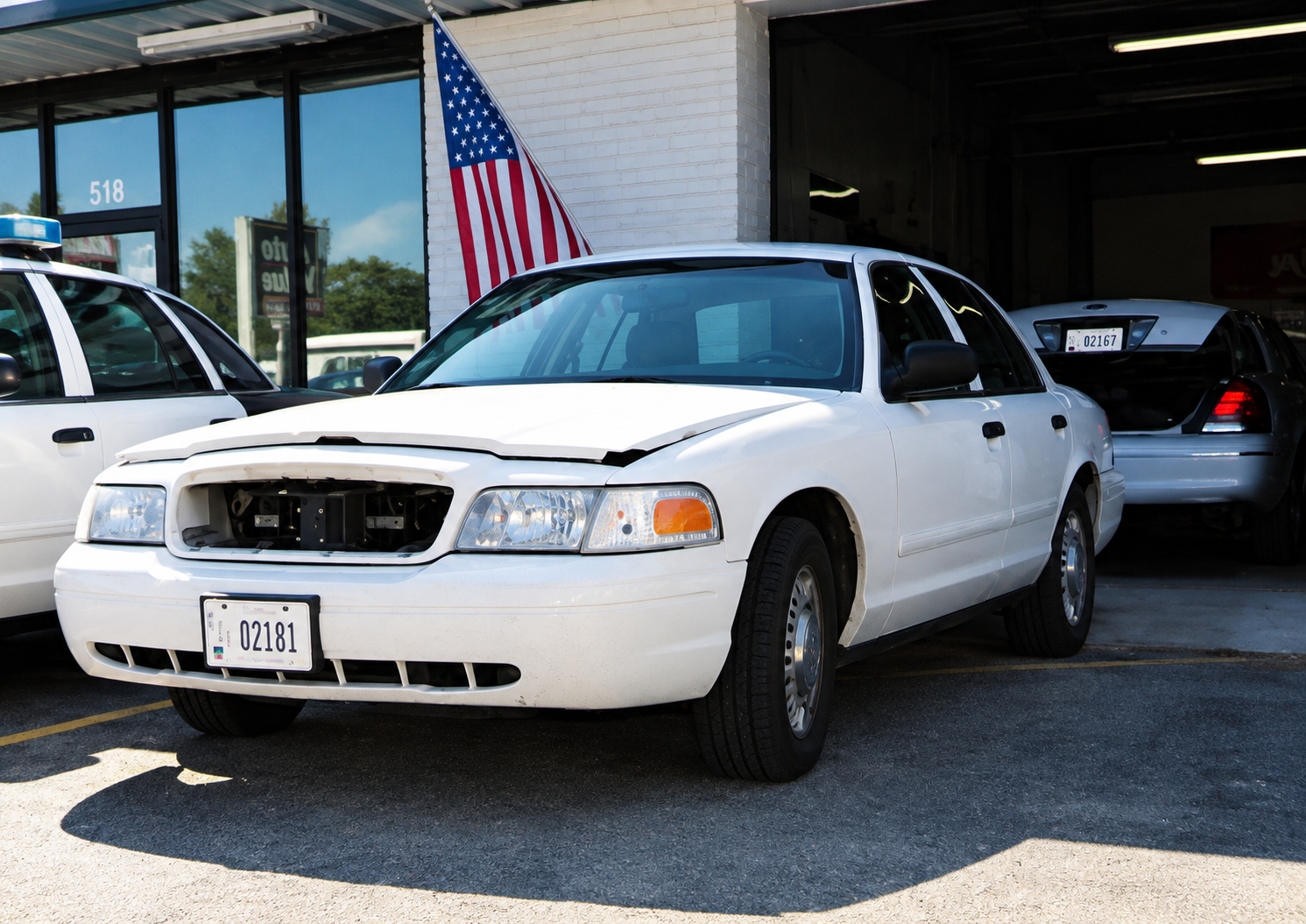 Retired government fleet Crown Victorias during vehicle processing circa 2002.