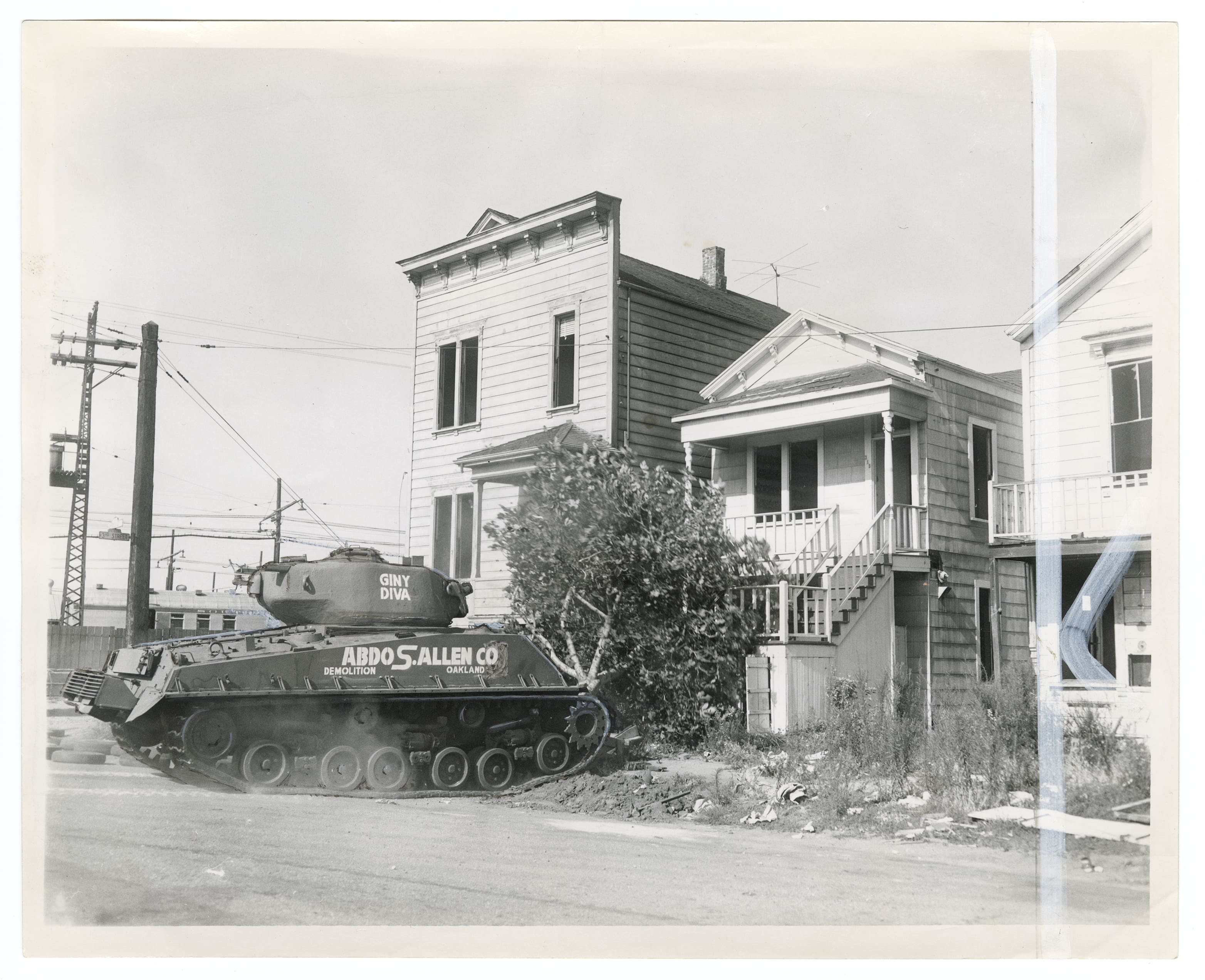 Surplus Sherman tank GINY DIVA operated by Abdo S. Allen demolition company in Oakland California 1960