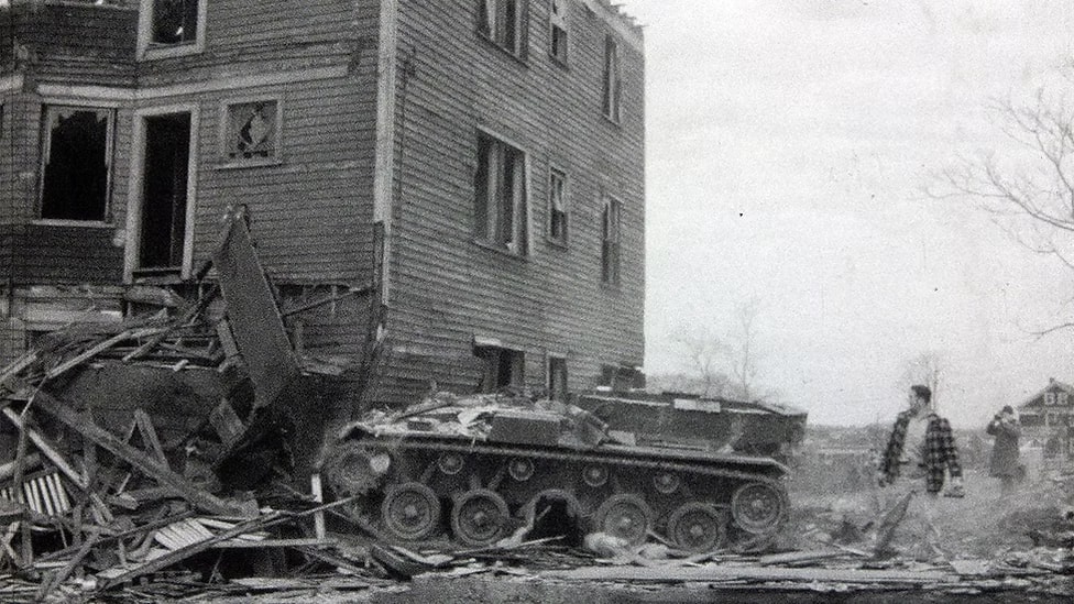 Surplus military armored vehicle used in civilian demolition work after military service