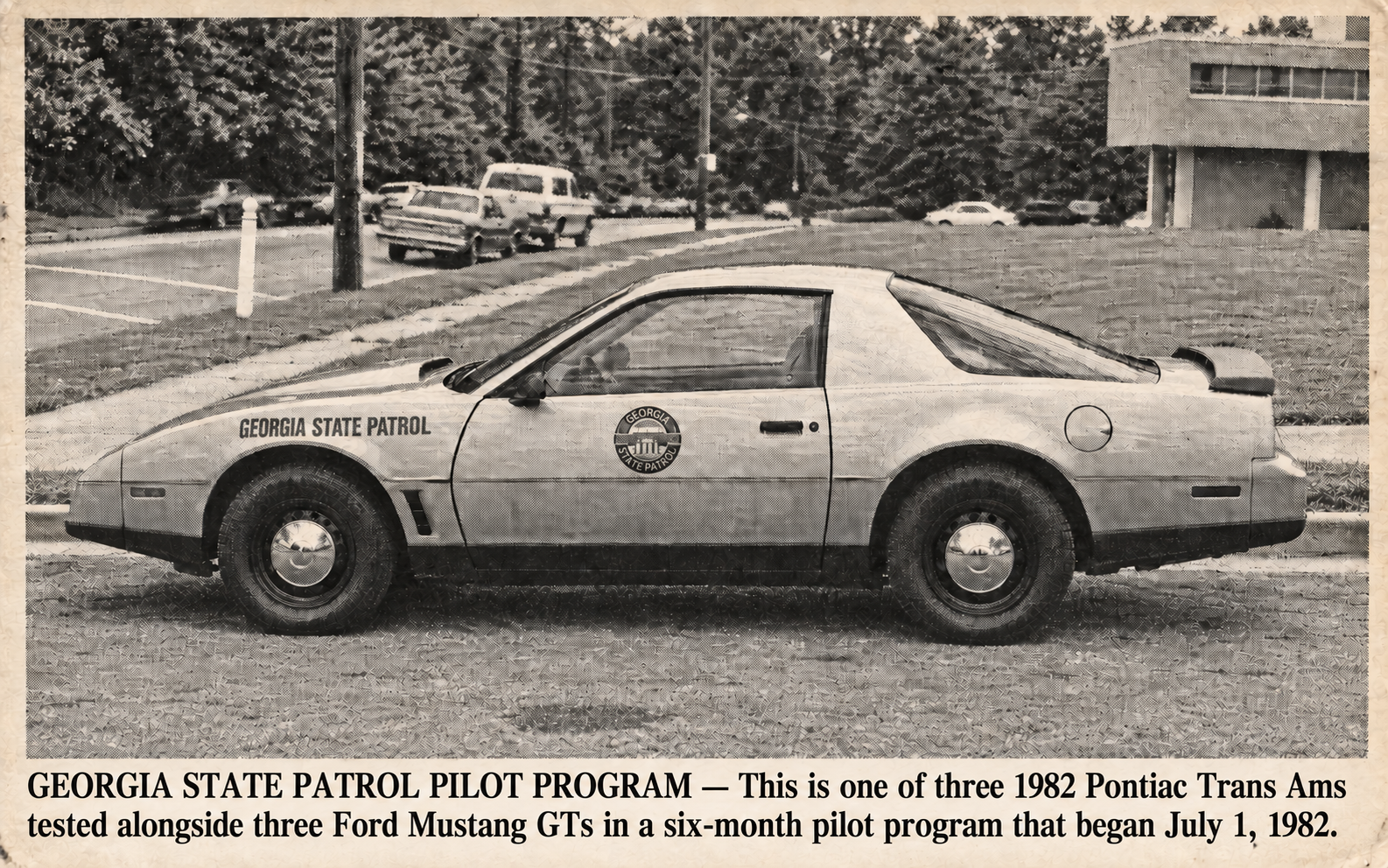 Georgia State Patrol troopers inspecting a 1982 Pontiac Trans Am during the pilot program
