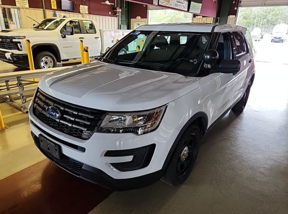 Ford Explorer photographed inside the auction facility during a public GSA vehicle sale