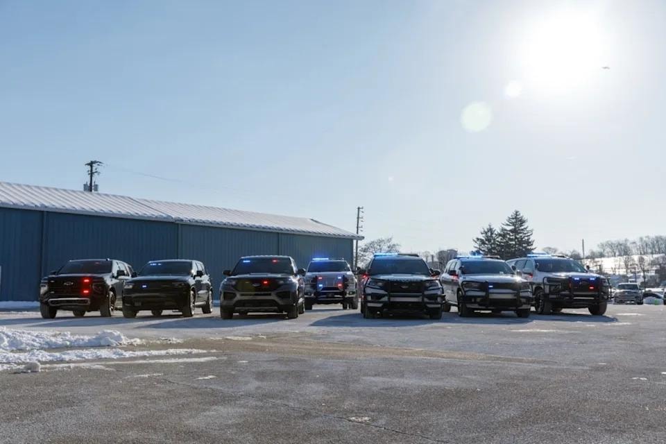 Modern Pennsylvania State Police vehicles lined up outdoors