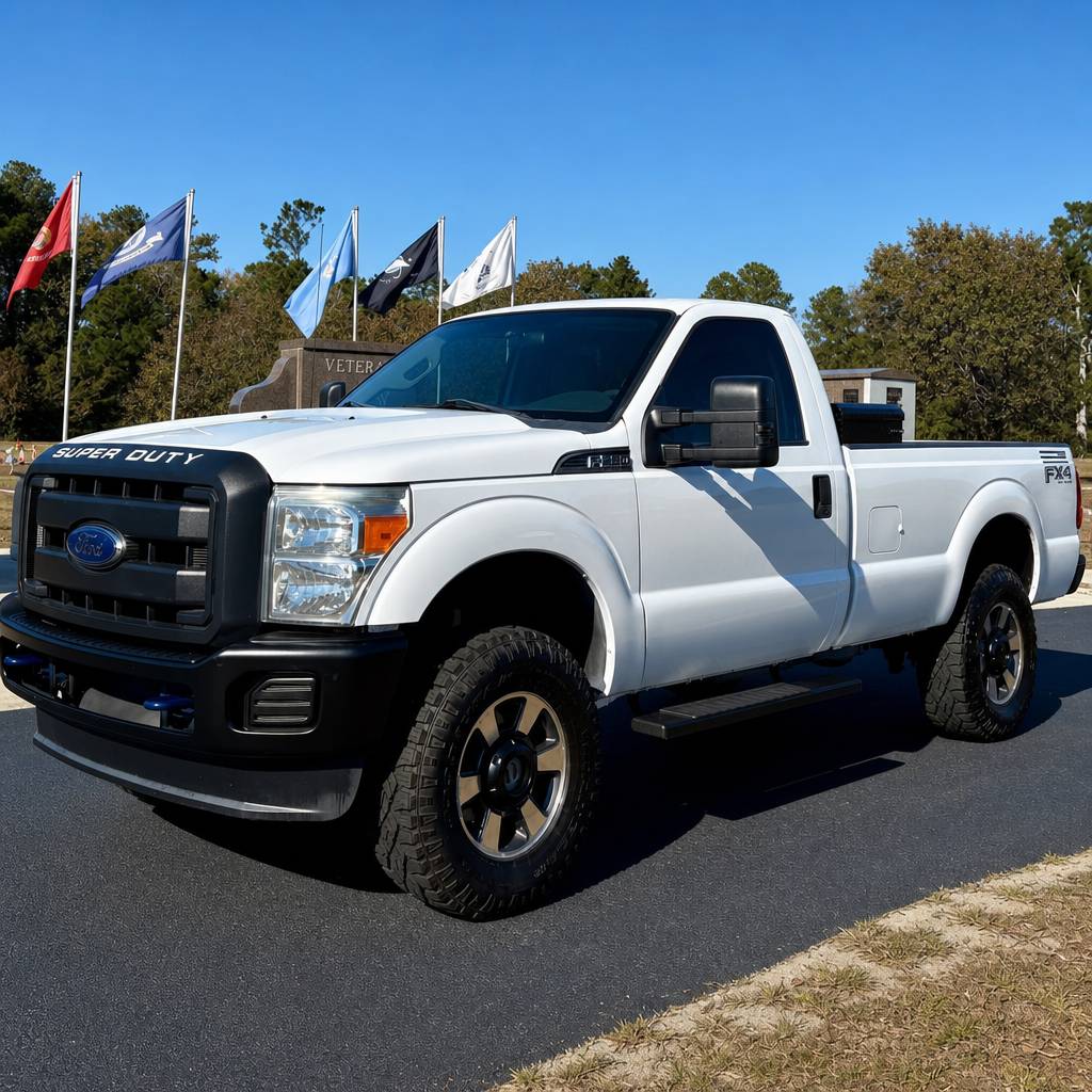 2012 Ford F-350 4x4 freshly repainted white with new tires rims and leveling kit installed