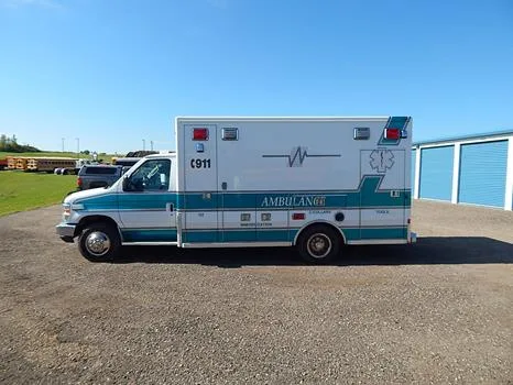 A 2013 Ford E450 Lifeline ambulance retired by Lodi Area EMS and offered at Wisconsin Surplus in October 2026.