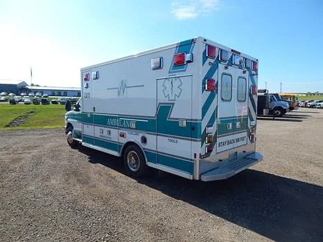 A 2013 Ford E450 Lifeline ambulance retired by Lodi Area EMS and offered at Wisconsin Surplus in October 2026.