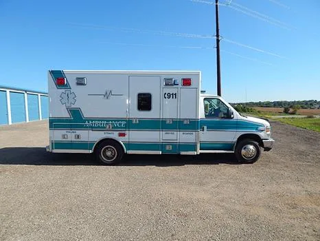 A 2013 Ford E450 Lifeline ambulance retired by Lodi Area EMS and offered at Wisconsin Surplus in October 2026.