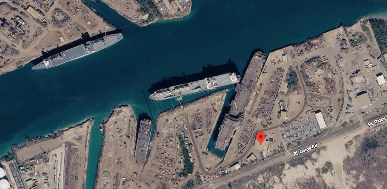 Aerial view of retired ships at the ship-recycling yards along the Brownsville Ship Channel in Texas