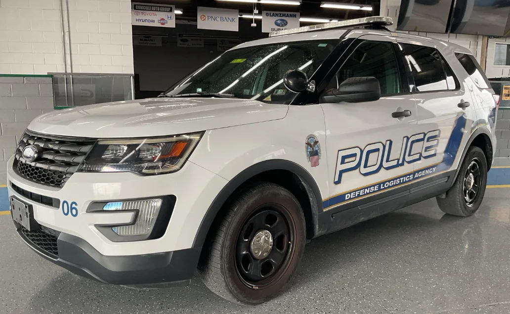 A Ford Police Interceptor Utility in Defense Logistics Agency Police markings