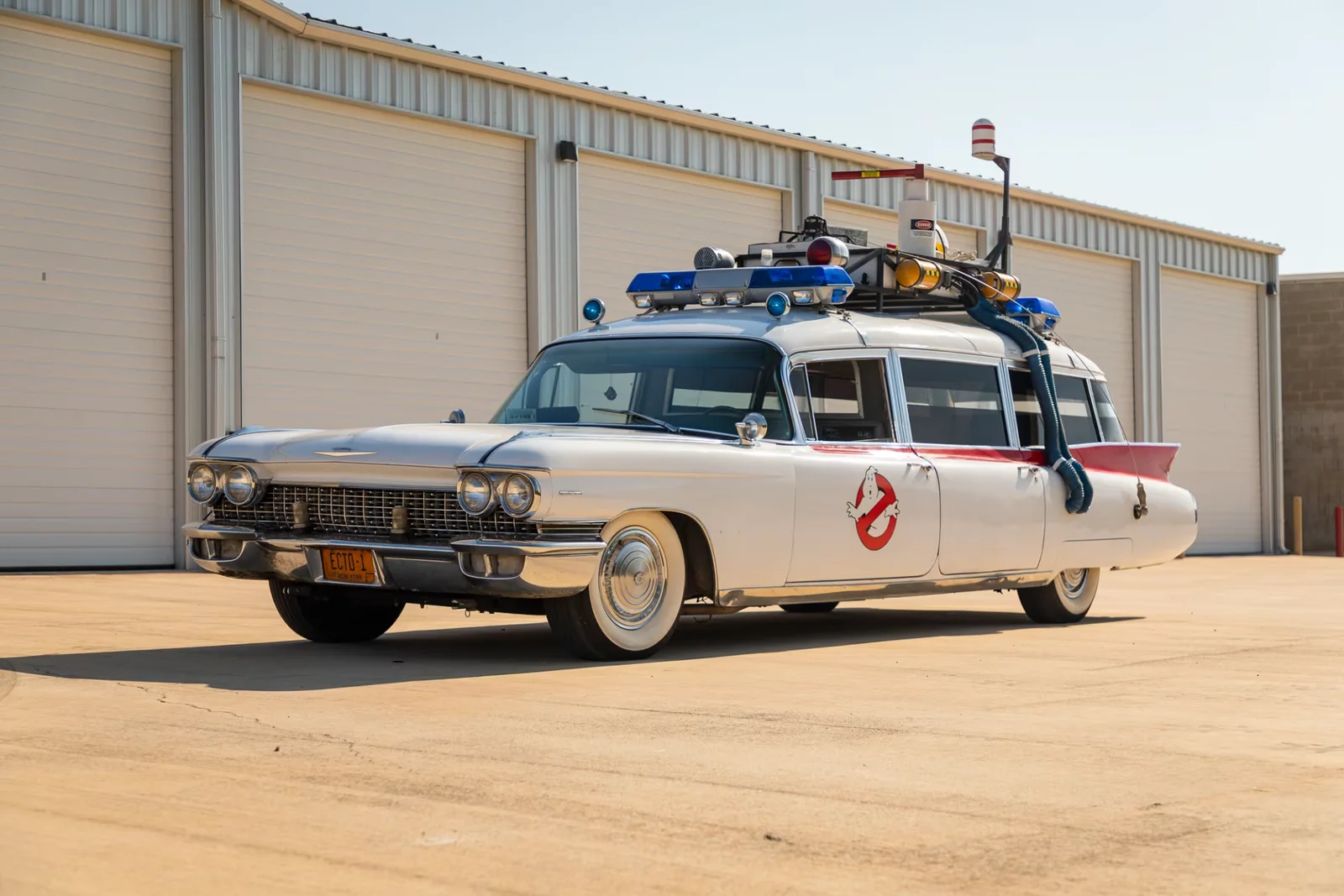 A 1959 Cadillac Ectomobile re-creation, with its roof rack, light bars, tailfins and no-ghost logos.
