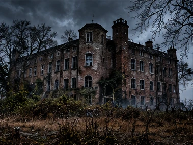 A crumbling brick asylum under storm clouds