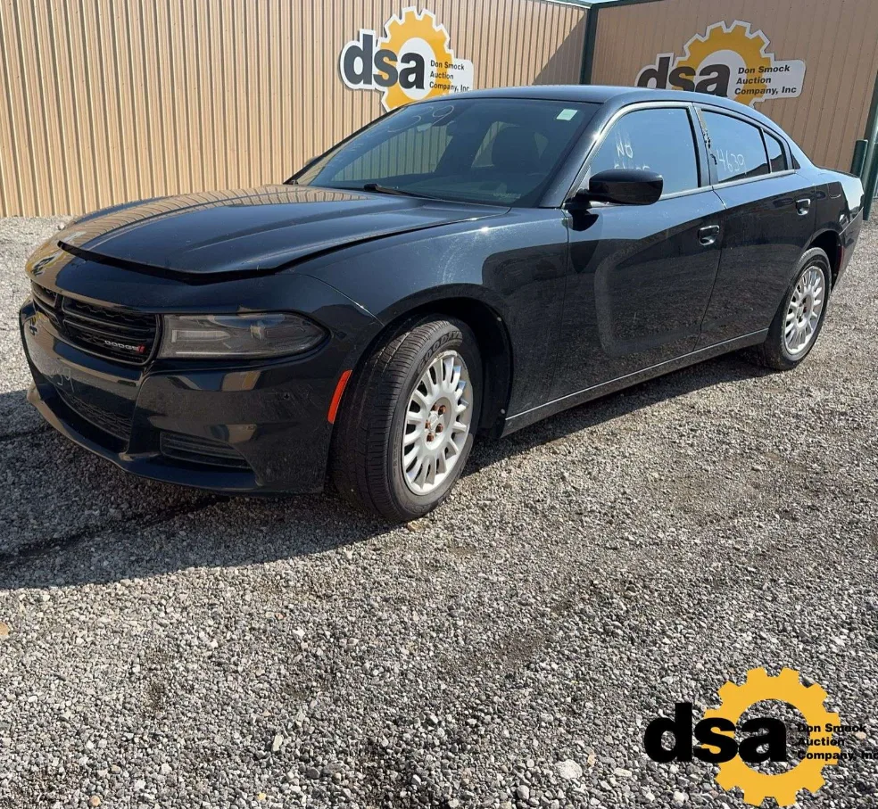 A black Dodge Charger Pursuit, front three-quarter view.