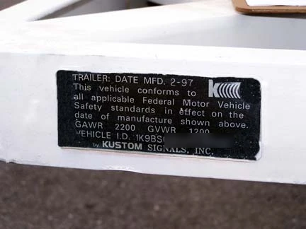 The Kustom Signals identification plate showing a February 1997 manufacture date