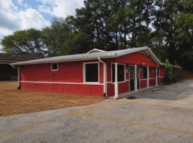 The Upshur County properties: the three buildings on US 259 in Diana, the red store at Highway 155 and FM 1404 in Big Sandy, and the storefront on US 271 in Gilmer. Photos: U.S. Department of the Treasury auction listings.