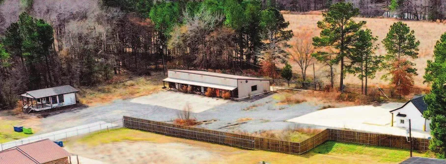 The Upshur County properties: the three buildings on US 259 in Diana, the red store at Highway 155 and FM 1404 in Big Sandy, and the storefront on US 271 in Gilmer. Photos: U.S. Department of the Treasury auction listings.