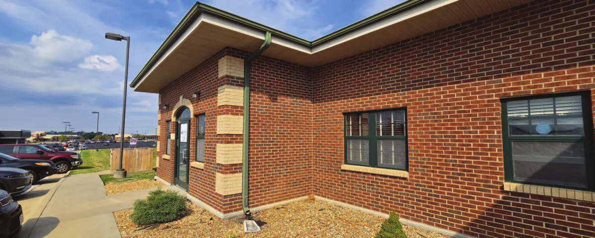 Summerfield, Florida; the Evergreen office condo in Springfield, Missouri; and the boarded service building on Division Avenue in Grand Rapids. Photos: U.S. Department of the Treasury auction listings.
