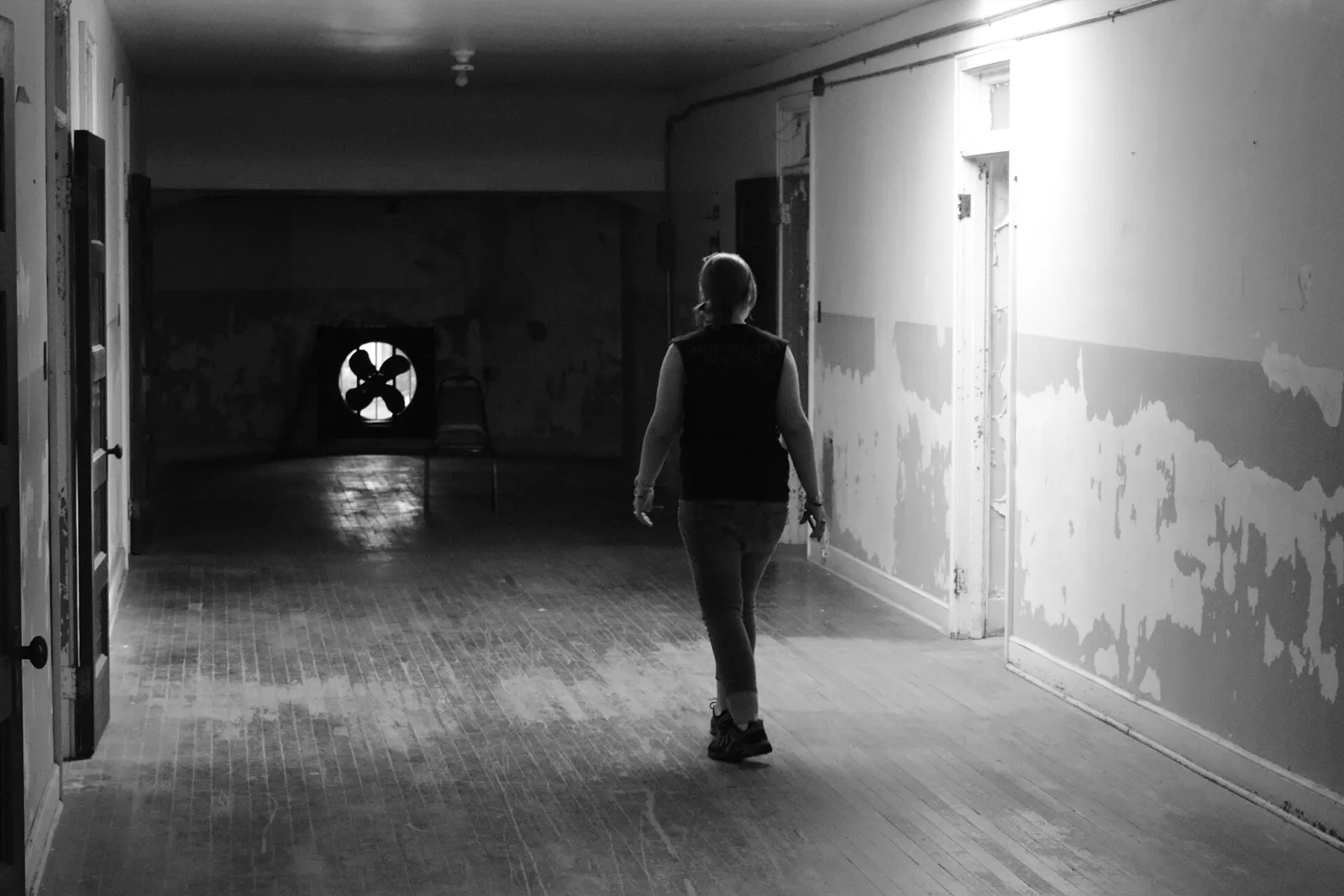 Visitors explore the empty wards on tour.