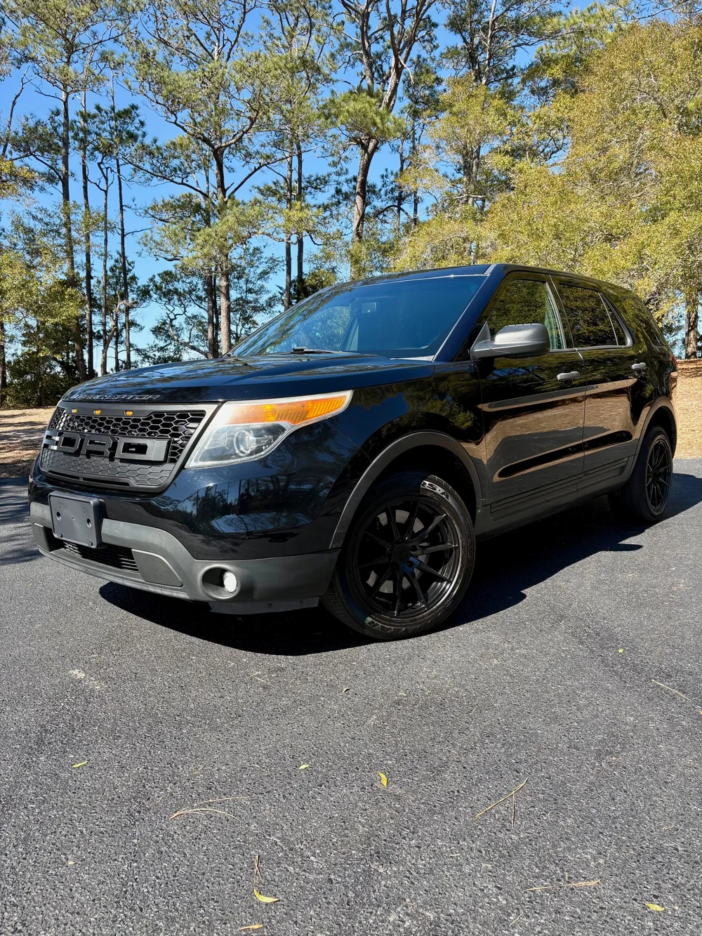 The black 2015 Ford Police Interceptor Utility, Unit 01, after the purchase.